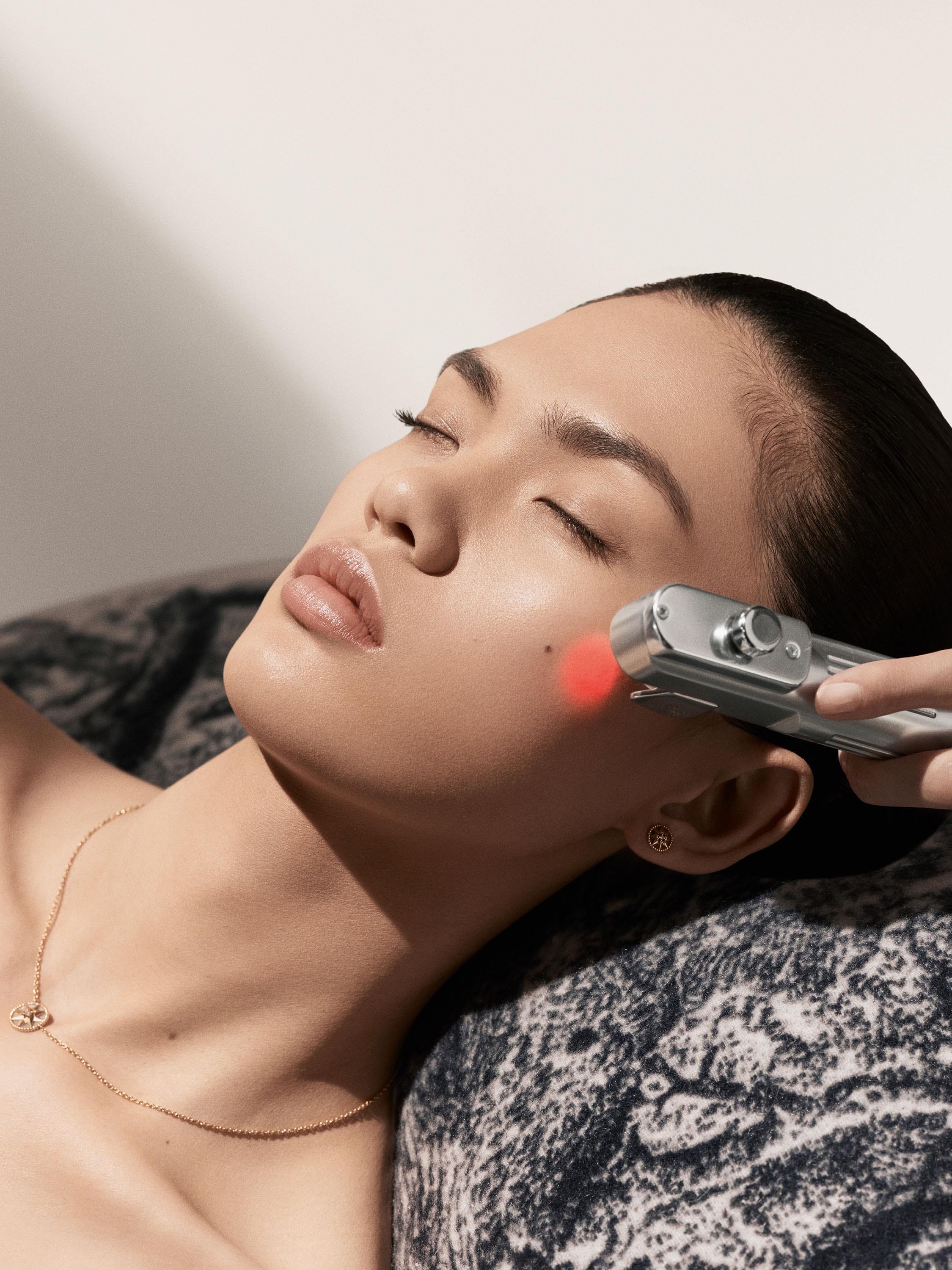 A woman receiving the Dior Microdermabrasion treatment   