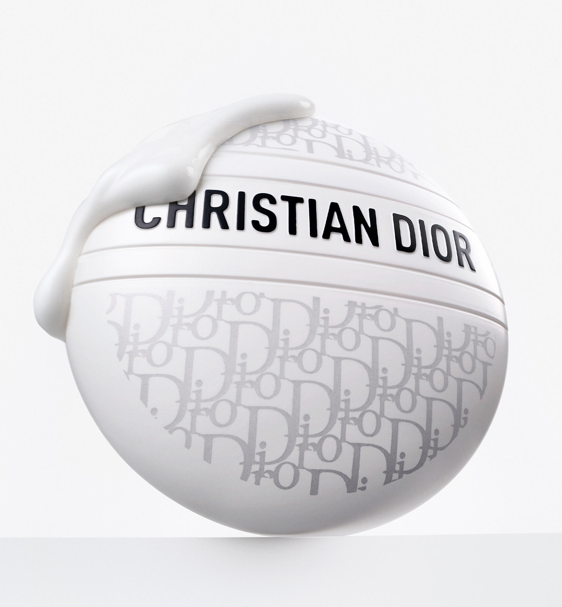 Tubes of Le Baume featuring limited-edition pink Toile de Jouy and couture gray Dior Oblique patterns